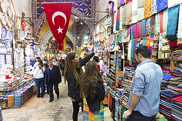 Young women tourists shopping in The Grand Bazaar, (Great Bazaar) (Kapali Carsi), Beyazi, Istanbul, Republic of Turkey, Europe