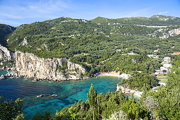 Paleokastritsa beach resort with cliffs and turquoise Ionian Sea in Corfu, Ionian Islands, Greek Islands, Greece, Europe