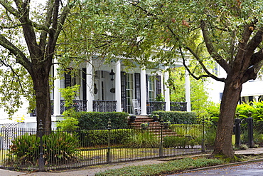 Traditional grand mansion house with columns in the Garden District of New Orleans, Louisiana, United States of America