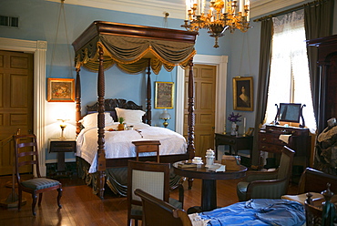 Oak Alley plantation antebellum mansion house interior of master bedroom with four poster bed in Vacherie, Louisiana, USA