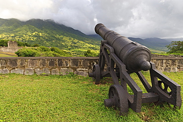 Cannon and green hills, Brimstone Hill Fortress, St. Kitts, St. Kitts and Nevis, West Indies, Caribbean, Central America 