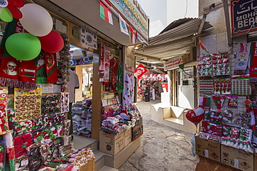 Flags and other Oman National Day decorations for sale at Mutrah Souq, Muscat, Oman, Middle East