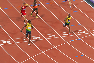 Usain Bolt crosses line with finger to lips, looks at Yohan Blake, Men's 200m final, London 2012, Olympic Games, London, England, United Kingdom, Europe