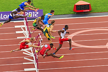 Competitors in Men's 110m hurdles semi-final clear hurdles, London 2012 Stadium, Summer Olympic Games, London, England, United Kingdom, Europe