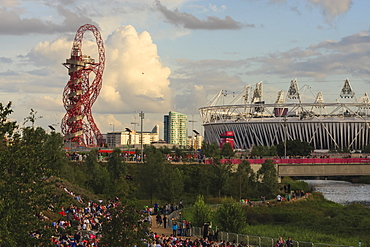 Crowds in the Olympic Park in early evening, with Orbit and Olympic Stadium, London 2012, Summer Olympic Games, London, England, United Kingdom, Europe