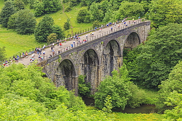 Monsal Trail, crowded with cyclists, former rail line viaduct over Monsal Dale at Monsal Head, Peak District, Derbyshire, England, United Kingdom, Europe