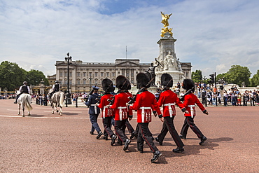 Changing the Guard at Buckingham Palace, New Guard marching, colourful spectacle and British pageantry, London, England, United Kingdom, Europe