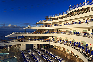 Cruise ship stern lit by evening sun, Norwegian Sea, the Arctic, off Spitsbergen, Norway, Scandinavia, Europe