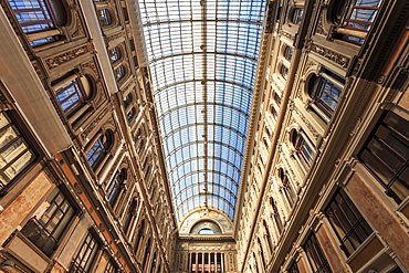 Morning light illuminates the Galleria Umberto I arcade, 1890, through its spectacular glass vaulted roof, City of Naples, Campania, Italy, Europe