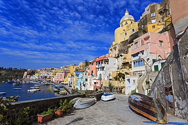 Marina Corricella, pretty fishing village, colourful fishermen's houses, boats and church, Procida Island, Bay of Naples, Campania, Italy, Europe