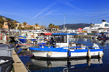 Old Port with fishing boats, cruise ship and ferries, view to distant mountains, Ajaccio, Island of Corsica, France, Mediterranean, Europe