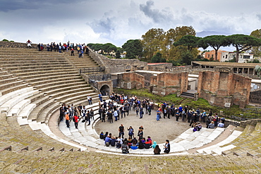 Tour groups in the Large (Grand) Theatre, Roman ruins of Pompeii, UNESCO World Heritage Site, Campania, Italy, Europe