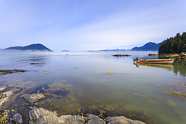 Jet-boats head for the Stikine River, mist clears from beautiful Petroglyph Beach, State Historic Park, Wrangell, Alaska, United States of America, North America