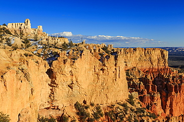 Cliffs and hoodoos lit by late afternoon sun in winter, Paria View, Bryce Canyon National Park, Utah, United States of America, North America