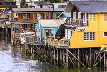 Palafitos, colourful stilt houses on water's edge, unique to Chiloe, Castro, Isla Grande de Chiloe, Chile, South America