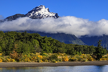 Snowy peak, lush forests, from Lake Todos Los Santos, Emerald Lake, Vicente Perez Rosales National Park, Lakes District, Chile, South America