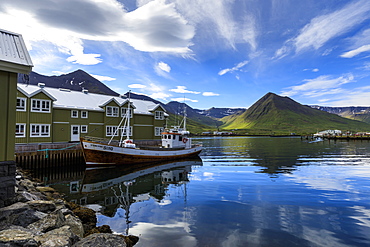 Fishing boat, hotel, mountain and fjord scenery, Siglufjordur, (Siglufjorour), stunning Summer weather, North Iceland, Europe, Europe