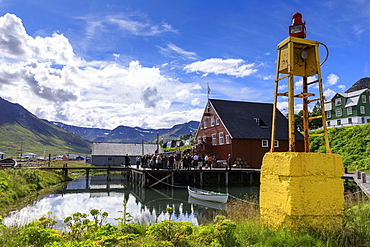 Tourists at the busy, award-winning Herring Era Museum, Siglufjordur, (Siglufjorour), stunning Summer day, North Iceland, Europe