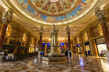 Statue and shoppers at The Forum Shops, Caesars Palace, Las Vegas, Nevada, United States of America, North America