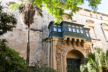 Courtyard with Maltese balcony and trees, Grand Master's Palace, (Palace of the Grand Master) former residence Knights' Grand Masters, UNESCO World Heritage Site, Valletta, Malta, Europe