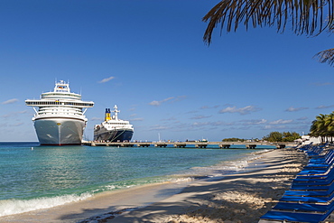 Cruise ships and disembarking passengers, seen from the cruise terminal beach, Grand Turk, Turks and Caicos, West Indies, Caribbean, Central America