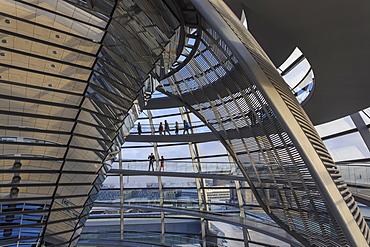 Reichstag dome interior with engaged visitors, early morning, Mitte, Berlin, Germany, Europe