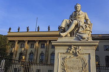 Statue of Alexander Humboldt lit by early morning sun, Humboldt University, Unter den Linden, Historic Mitte, Berlin, Germany, Europe