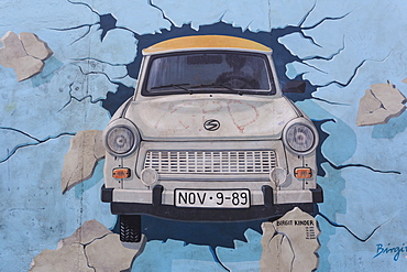 Trabant car breaks through wall in mural Test the Rest by Birgit Kinder, Berlin Wall, East Side Gallery, Friedrichshain, Berlin, Germany, Europe