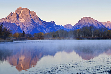 Dawn mist, Mount Moran, Oxbow Bend, Snake River, Grand Teton National Park, Wyoming, United States of America, North America 