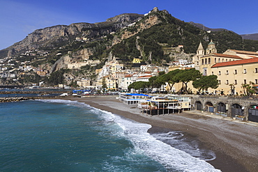 Beach, town and hills of Amalfi in sunshine with breaking waves, Costiera Amalfitana (Amalfi Coast), UNESCO World Heritage Site, Campania, Italy, Europe