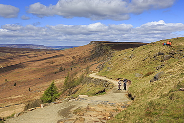 Walkers, Stanage Edge, on a fine spring day, near Hathersage, Peak District National Park, Derbyshire, England, United Kingdom, Europe