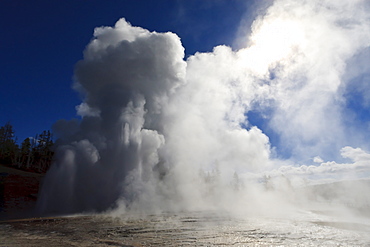 Grand Geyser erupts and steam blocks the sun, Upper Geyser Basin, Yellowstone National Park, UNESCO World Heritage Site, Wyoming, United States of America, North America 