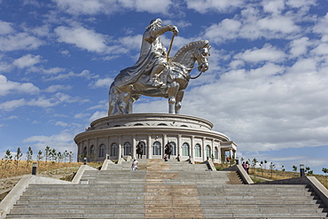 Huge silver stainless steel Chinggis Khaan (Genghis Khan) statue with blue sky, Tsonjin Boldog, Tov Province, Central Mongolia, Central Asia, Asia