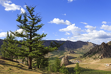 Elevated view towards Turtle Rock and distant mountains, busy with visitors in summer, Terelj National Park, Central Mongolia, Mongolia, Central Asia, Asia