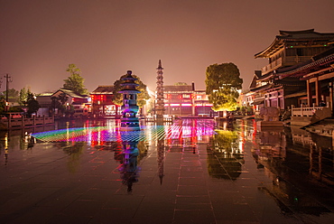 Reflections of LED lighting in the rain at Xiangji Temple, Hangzhou, Zhejiang, China, Asia 