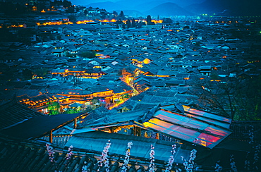 Blue hour shot over roofs of Lijiang Old Town, UNESCO World Heritage Site, Lijiang, Yunnan, China, Asia 