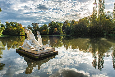 Statues and reflections at Schwetzingen Palace lake, Schwetzingen, Baden-Wurttemberg, Germany, Europe. 