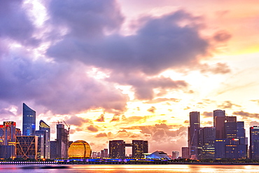 Dramatic sunset clouds over new skyscrapers of Hangzhou new business district, Jianggan (Qianjiang New Town), Hangzhou, Zhejiang, China, Asia