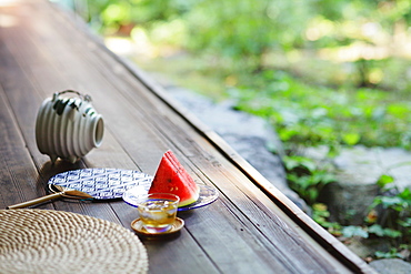 Sliced Watermelon And Traditional Mosquito Repellent