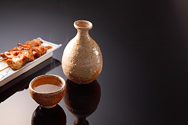 Traditional Japanese Sake Cup and Jug