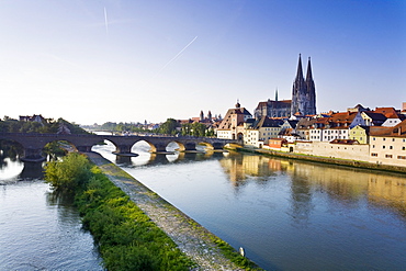 View of Cathedrals and Stone Bridge over Danube river in Regensburg, Germany