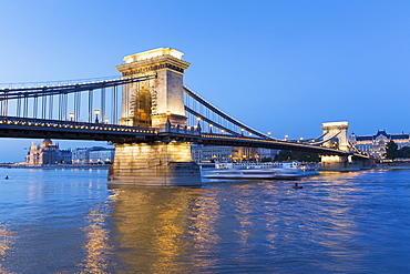 A view from the Pest Bank of the 380 metre long Chain Bridge at dusk, Budapest, Hungary