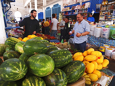 A fruit stand in a market hall in Larache, Morocco