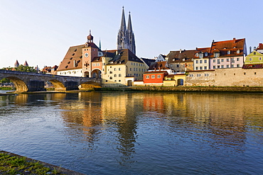 View of Cathedrals and Stone Bridge over Danube river in Regensburg, Germany