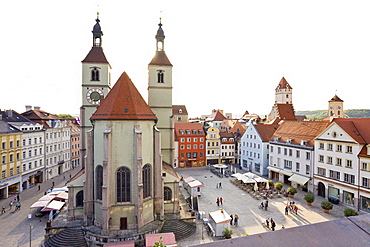 View of Neupfarrkirche, Golden Tower and Town Hall in Neupfarrplatz, Regensburg, Germany