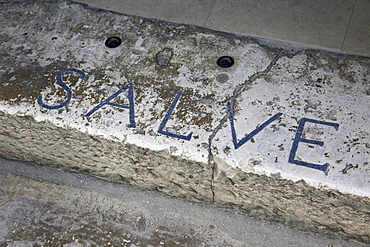 Close-up of Salve font on doorstep in Solin, Dalmatia, Croatia