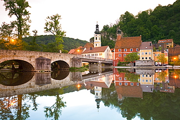 View of bridge, Naab river and medieval village of Kallmunz, Bavaria, Germany