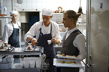 Team Magnus working at Oaxen Krog Restaurant, Stockholm