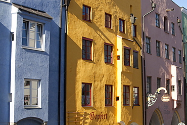 Blue, yellow and pink building in Wasserburg am Inn in Rosenheim, Bavaria, Germany