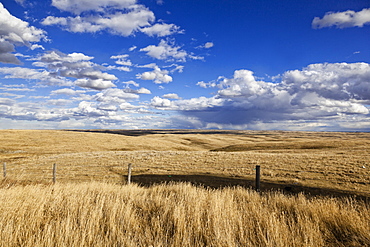 View of landscape with clouds and blue sky in Saskatchewan, Canada